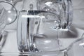 Transparent glassware arranged on a white surface Royalty Free Stock Photo