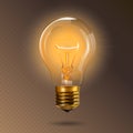 Transparent glowing electric light bulb with a gold base. Realistic style.