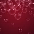 Transparent heart bubbles on maroon background