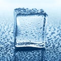 Transparent ice cube with reflection on blue glass with water drops Royalty Free Stock Photo