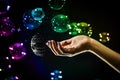 The transparent, iridescent soap bubbles isolated on black. Royalty Free Stock Photo