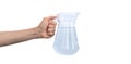 Transparent jar of water, carafe glass in hand isolated on a white background photo