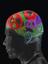 Transparent man's skull with colour curve gears