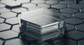 A transparent, multi-layered hexagonal glass object rests on a textured surface Royalty Free Stock Photo