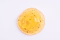 Transparent orange cosmetic sample texture with bubbles. Cosmetic peeling gel with fruits. Cosmetic scrub, beauty background