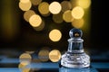 Transparent Pawn On Blue Chessboard With Bokeh Royalty Free Stock Photo