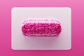 Transparent pill with pink candy hearts Royalty Free Stock Photo