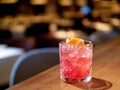 Transparent pink alcohol cocktail, vodka gin-tonic