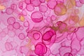 Transparent pink and gold watercolor drops texture. Bubbles imitation.