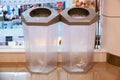 Transparent plastic bins in shopping mall