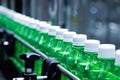 transparent plastic bottles on the conveyor belt moving very fast into water filling machine in the drinking water factory. Royalty Free Stock Photo