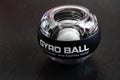 Transparent plastic gyroball on black background Royalty Free Stock Photo