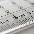 A transparent plastic ruler displaying centimeter and millimeter Royalty Free Stock Photo