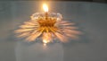 Transparent plastic wick oil lamp with yellow shadow and glaze