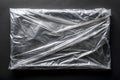 Transparent Plastic Wrap on Black Background Mock-Up Royalty Free Stock Photo