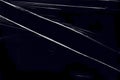 A transparent plastic wrap with a stretch on black background. Royalty Free Stock Photo