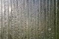 Transparent polycarbonate sheet with morning dew drops. Abstract background Royalty Free Stock Photo