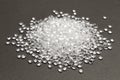 Transparent Polyethylene granules on dark .HDPE Plastic pellets. Plastic Raw material . IDPE. Royalty Free Stock Photo