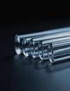 Transparent preform tubes arranged in a row, ready for molding Royalty Free Stock Photo