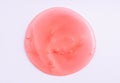 Transparent red cosmetic sample texture with bubbles.Shower gel. Cosmetic red serum, beauty background Royalty Free Stock Photo