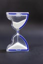 Transparent Sand Time Management Tool On Black Background Royalty Free Stock Photo