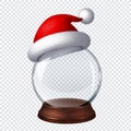 Transparent snow globe with Santa hat on checkered background Royalty Free Stock Photo