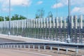 Transparent sound-reflecting soundproof panels on the sides of the freeway