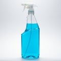 A transparent spray bottle filled with blue liquid stands upright. The bottle features an Royalty Free Stock Photo