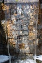 Transparent stream of flowing water in park cascade fountain Royalty Free Stock Photo