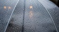 A transparent umbrella is covered with raindrops, creating an intricate pattern of water Royalty Free Stock Photo