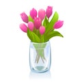 Transparent vase with tulips