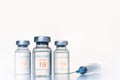 Transparent vials, syringe with new vaccine for covid-19 coronavirus, flu, infectious diseases. Injection after clinical trials