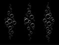 Transparent white bubbles flying in air or underwater, isolated on black background Royalty Free Stock Photo