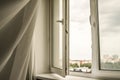 Transparent curtain on open plastic window Royalty Free Stock Photo