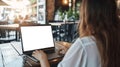 Transparent Laptop Mockup: Woman Working in Caffe, First Person View