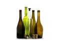 Transparent wine bottle, green wine bottle, brown wine bottles and wine corks isolated on white Royalty Free Stock Photo