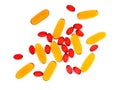 Transparent yellow and red capsules.