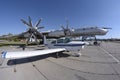 Transport aircrafts and light planes parked in the park of an air show