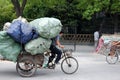 Bike transport, overloaden bike with plastic sacs