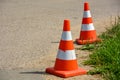 transport cone, with white and orange. Concept: Direction of transport or flow of people, road safety Royalty Free Stock Photo