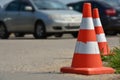 transport cone, with white and orange. Concept: Direction of transport or flow of people, road safety Royalty Free Stock Photo