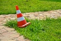 transport cone, with white and orange. Concept: Direction of transport or flow of people, road safety Royalty Free Stock Photo