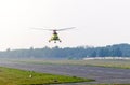 A transport helicopter take off from runway in a small airport. Royalty Free Stock Photo