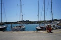 Mandraki harbor off the coast of Rhodes, Greece Royalty Free Stock Photo