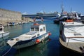 Mandraki harbor off the coast of Rhodes, Greece Royalty Free Stock Photo