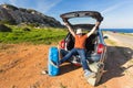 Transport, leisure, road trip and people concept - happy man enjoying road trip and summer vacation. Royalty Free Stock Photo