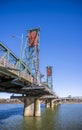 The transport and pedestrian truss Hawthorne bridge with two towers across the Willamette River in the center of Portland Oregon Royalty Free Stock Photo