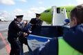 Transport police remove aviation rowdy from the plane at the airport
