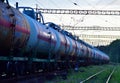 Transport tank car LNG by rail, gas - oil products. LPG transport propane. The fuel train, rolling stock with petrochemical tank Royalty Free Stock Photo