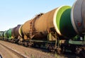 Transport tank car LNG by rail, gas - oil products. LPG transport propane. The fuel train, rolling stock with petrochemical tank Royalty Free Stock Photo